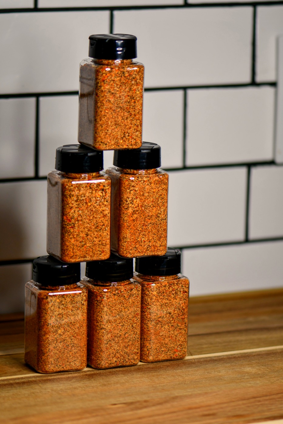 A pyramid of Snake Oil Spices jars