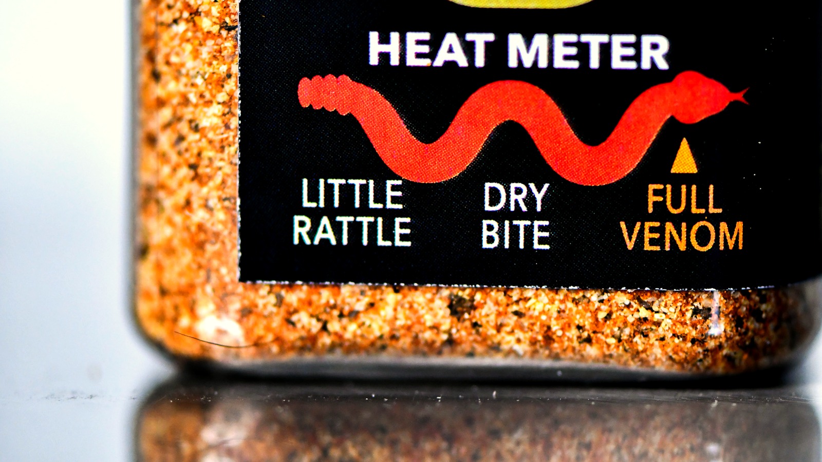 The Snake Oil Spices heat meter — Little Rattle, Dry Bite, Full Venom